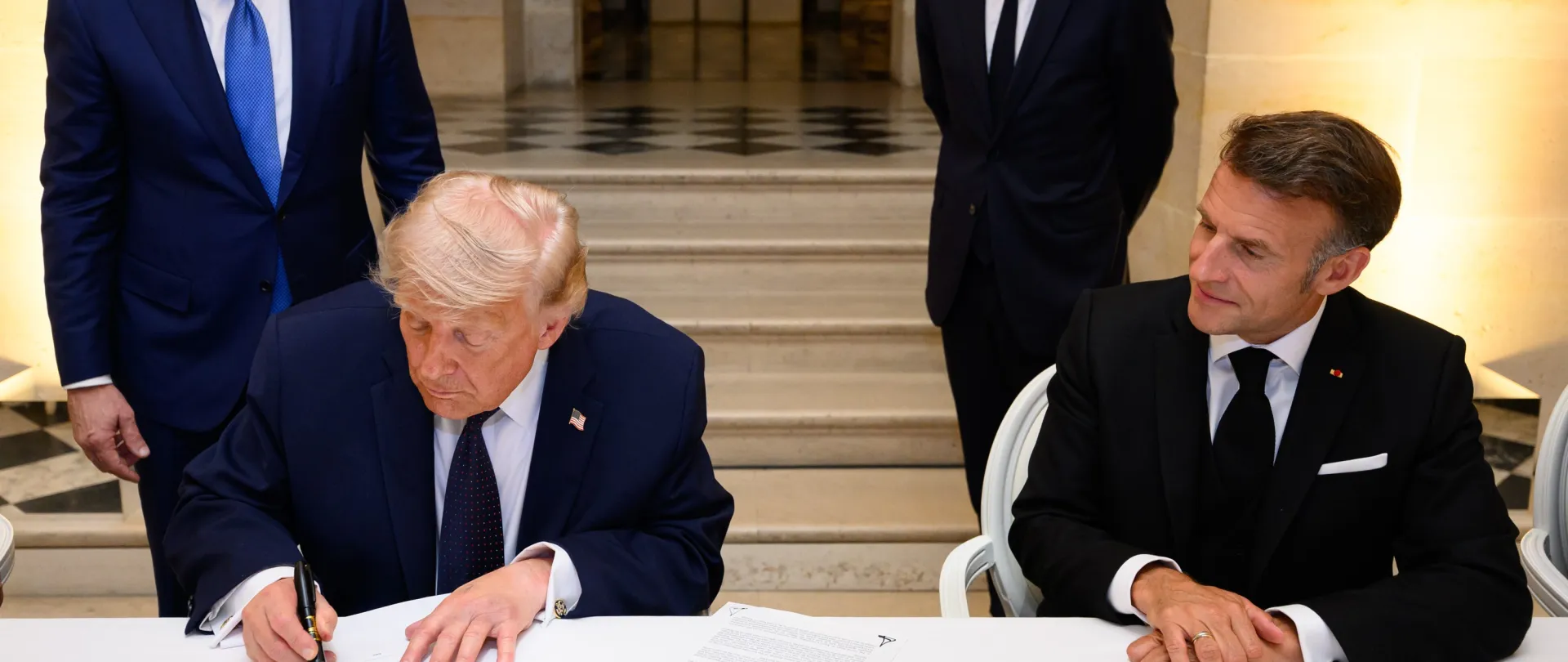 Trump signs a Memorandum of Understanding between the Islamic Republic of Iran and the United States at the Palace of Versailles on 17 June 2026